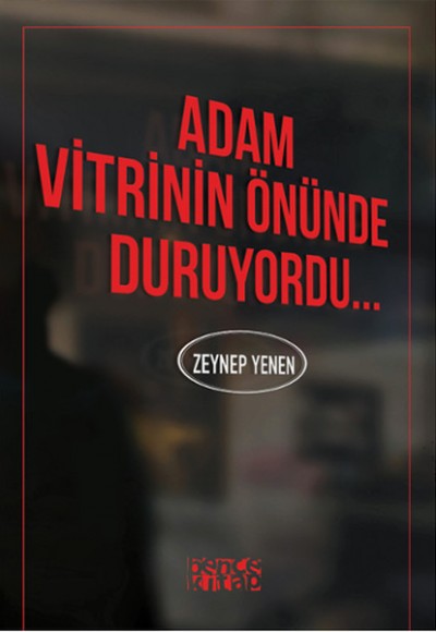 Adam Vitrinin Önünde Duruyordu...